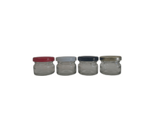 Load image into Gallery viewer, 4 row of 4x 28ml glass jars, each with a different colour lid. Black, gold, red and white.
